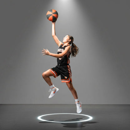 Basketball player in mid-air with a HouseHoops Basketball, against a gray background