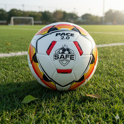 Pace 2.0 Football with Safe Sport Gear logo resting on green grass outdoors