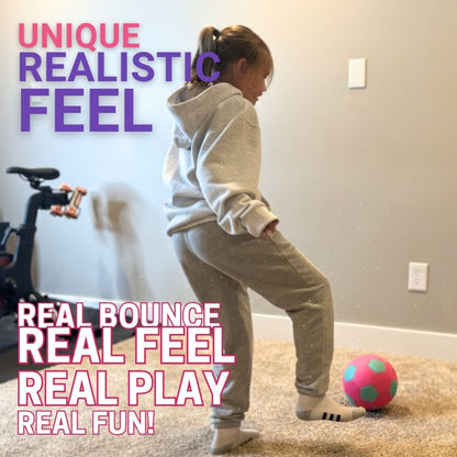 Child playing with The Pink House Ball in a room with text about realistic play experience.