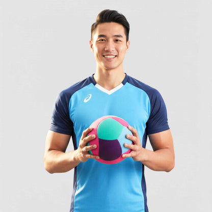 Man holding a softy volleyball - Teal wearing a blue and navy sports jersey on a light gray background