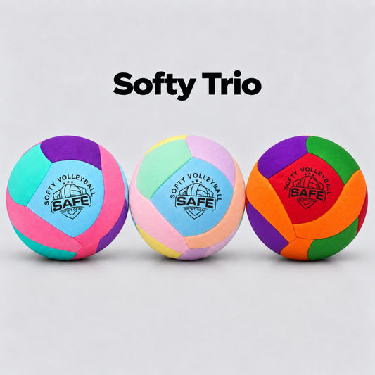 Three colorful soft volleyball balls labeled Softy Trio on a light gray background, each with different pastel and bright color panels and the Safe Sport Gear logo printed on the front.